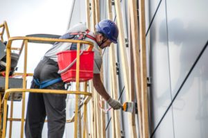 Rénovation ornement façade en bois